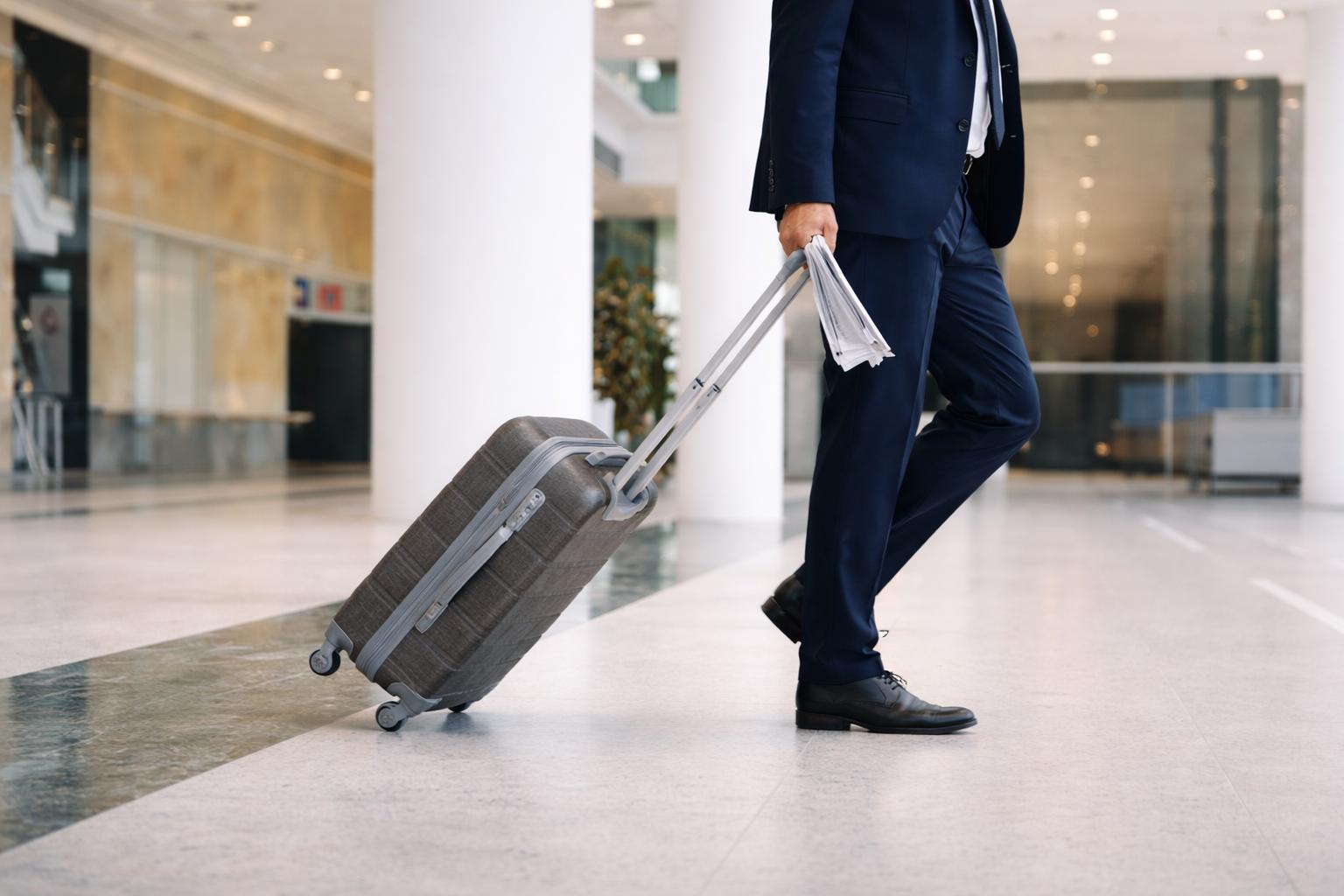 Business traveler with a suitcase